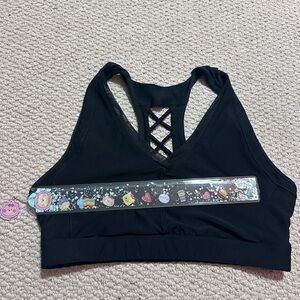 Black sports bra with a cute design on the back Size Large 14 inch pit to pit